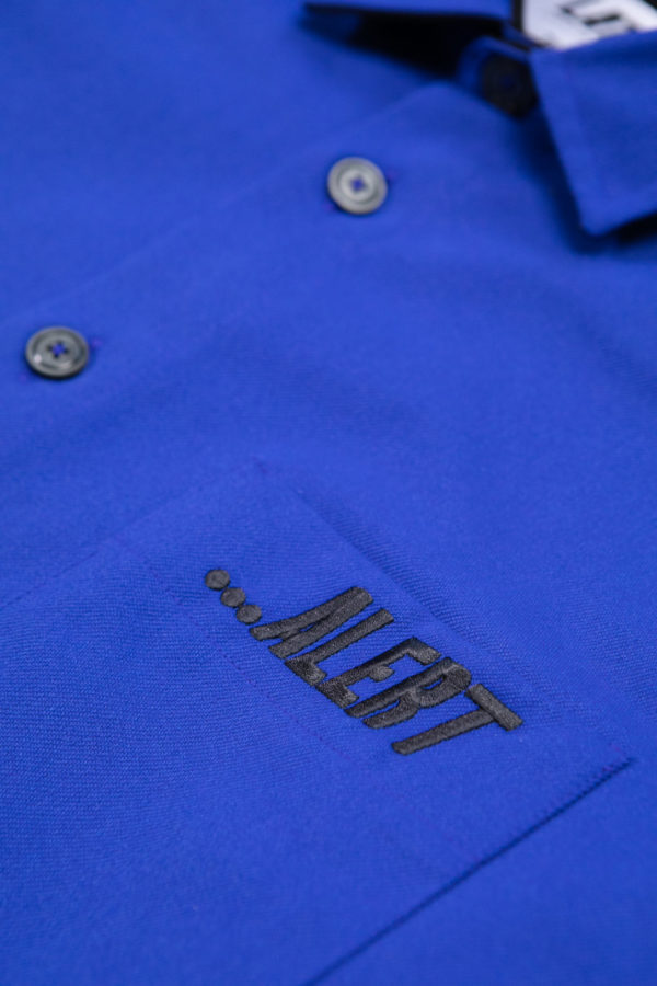ALERT embroidery on the royal blue recycled cotton oversized jacket